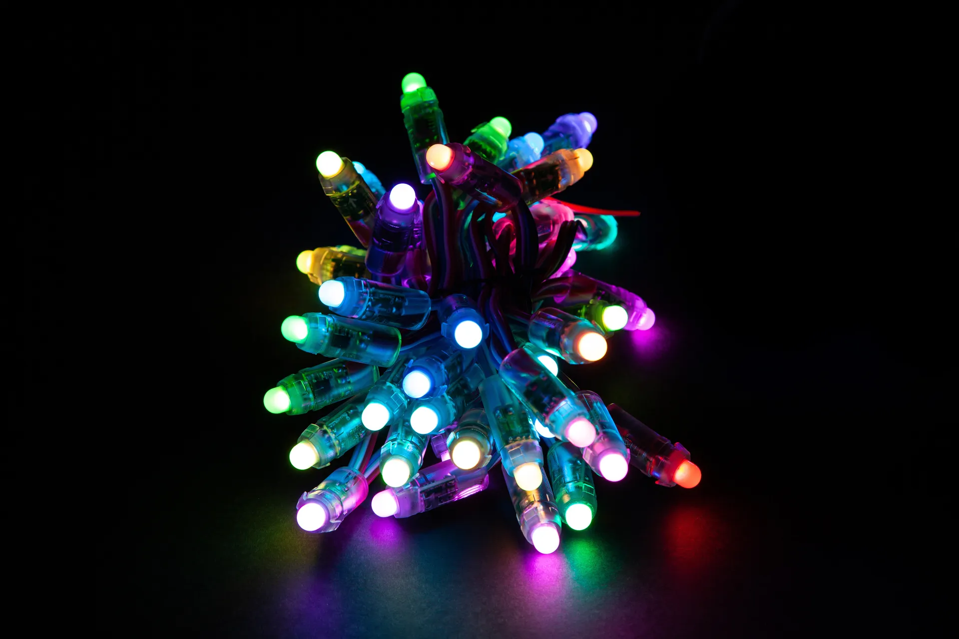RGB pixel lights creating colorful patterns on a Christmas display