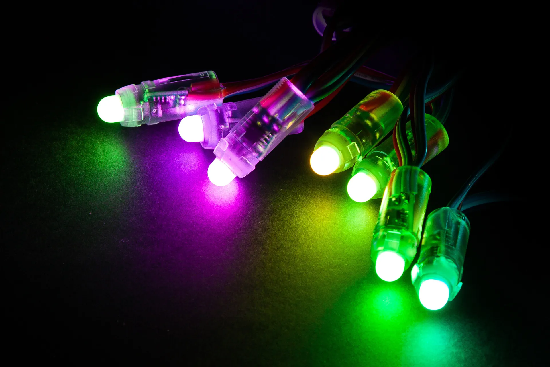 Inspecting Christmas light bulbs for damage