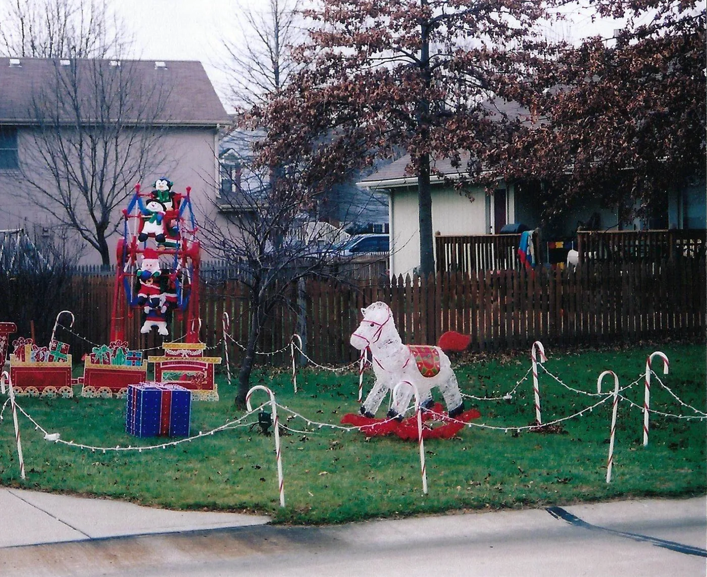 A tall toy soldier tower and a rocking horse among the candy canes in 2009
